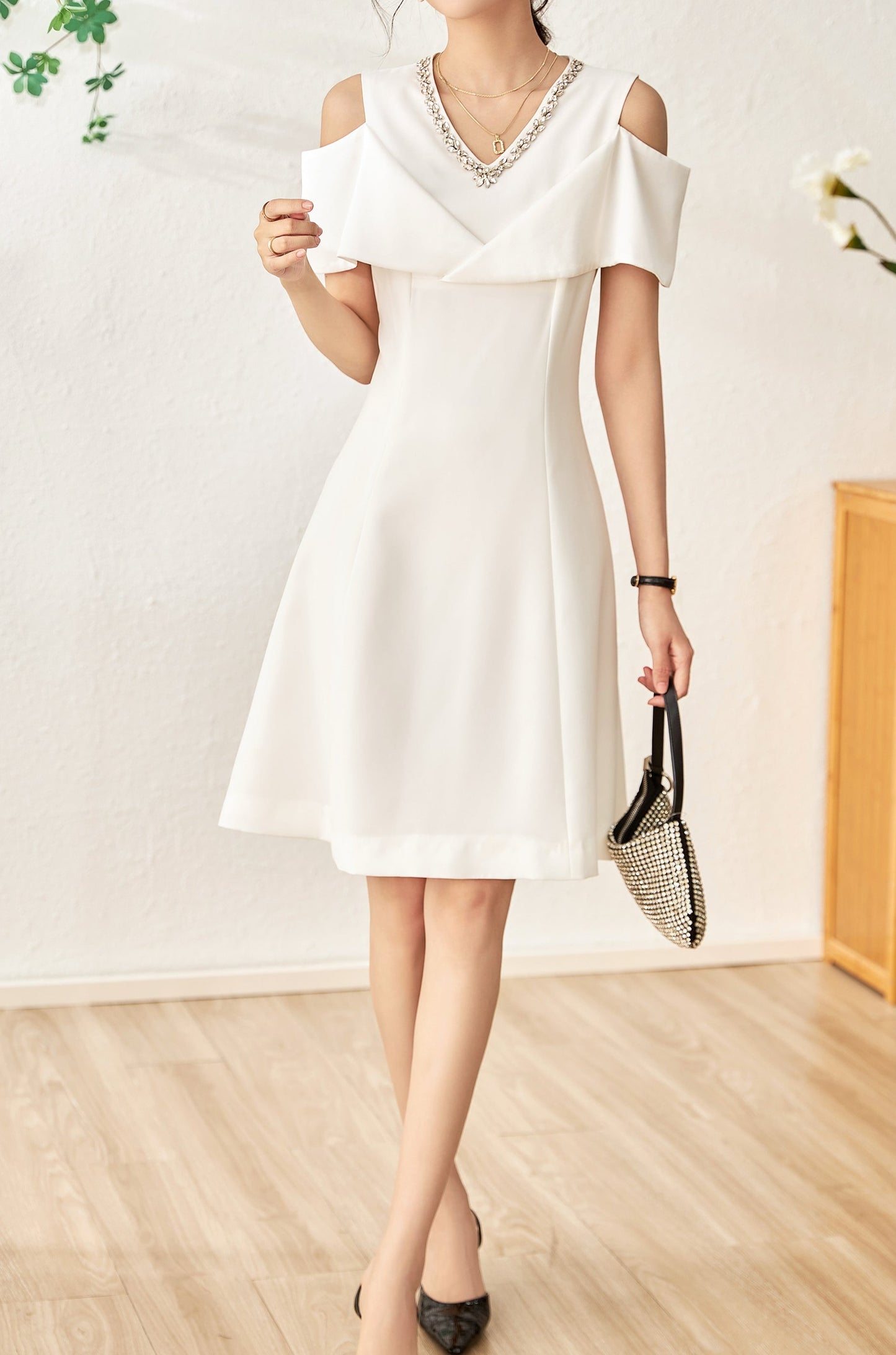 Faustine crystal collar hemp knee dress with cut out shoulder