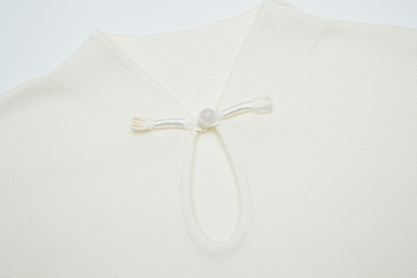 Bora mandarin collar knit blouse with key hole