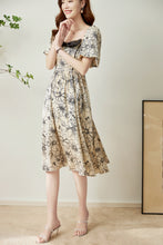 Load image into Gallery viewer, Bjorg floral front ribbon printed satin dress with gathered back and elastic waist
